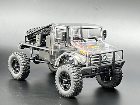 Detailed 1/18 scale RC Trail Hunter model with off-road tires, functional accessories, and rugged construction for outdoor adventures.
