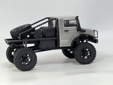 Rugged 1/18 scale RC Trail Hunter in sleek silver finish, ready for off-road adventure.