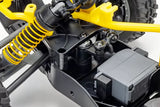Rugged yellow and black electric RC buggy with powerful suspension and drivetrain components visible in the image.