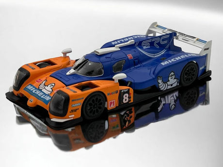 Detailed 1/32 scale SRC Slot Toyota LMP1 Chrono Series Michelin #8 race car model on reflective surface