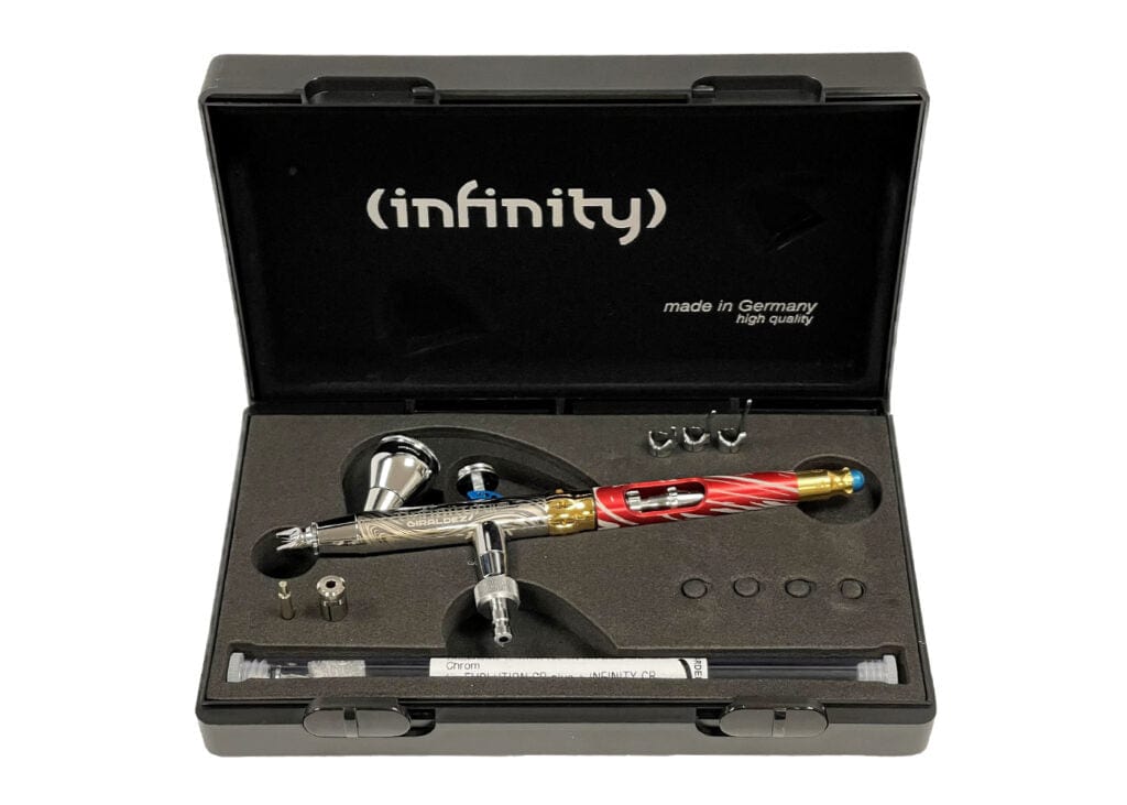 Harder & Steenbeck high-precision airbrush, featuring a 2-in-1 design with 0.2mm and 0.4mm nozzle sizes, housed in a sleek black carrying case.