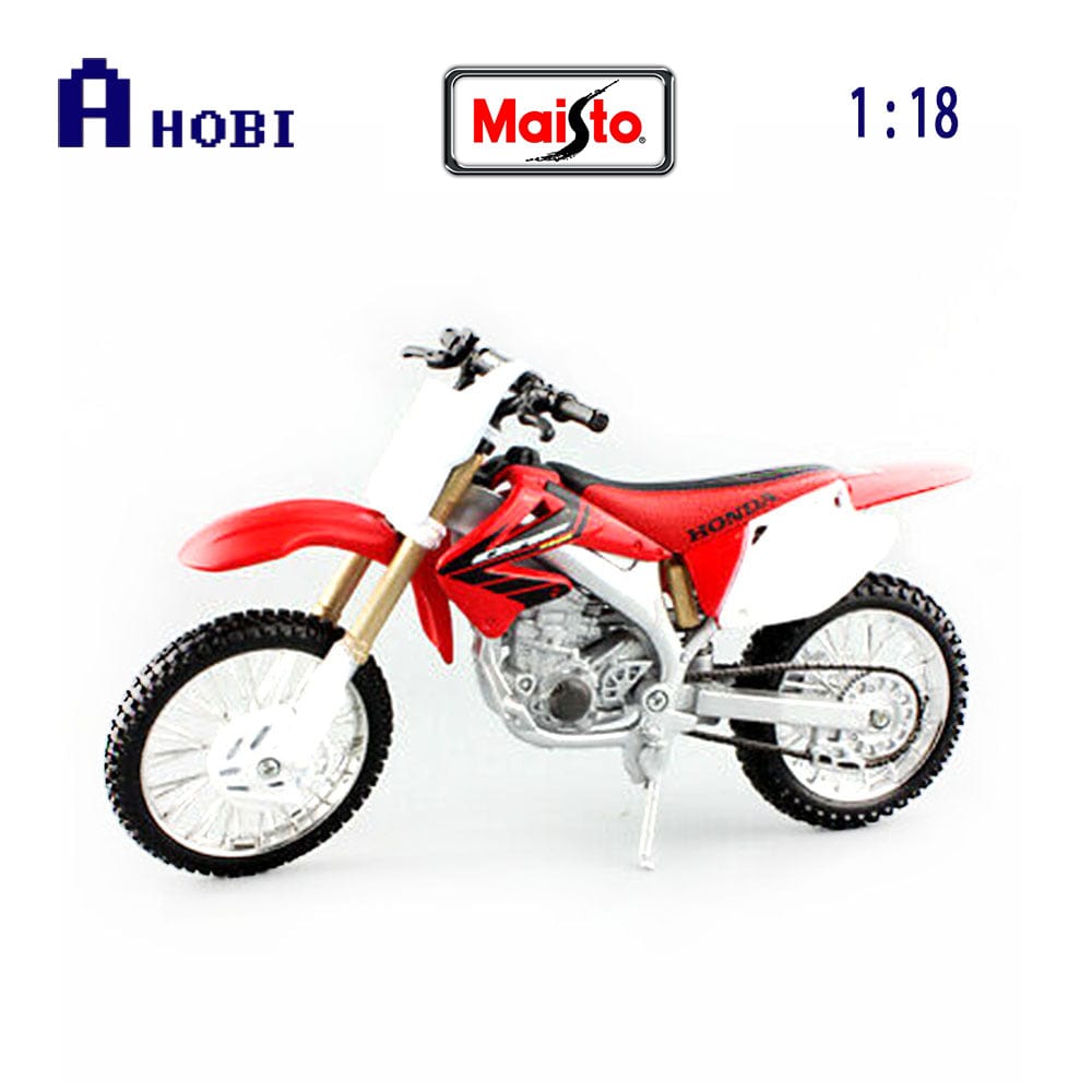 Detailed red Maisto 1/18 scale dirt bike model on display
