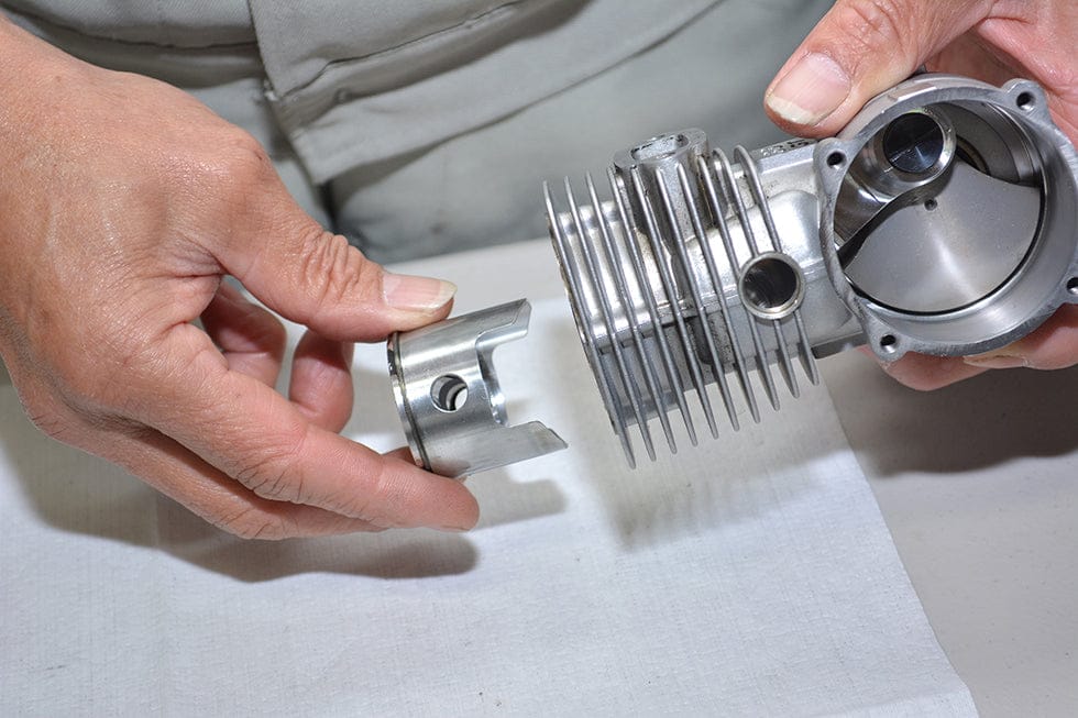 OS Engines GT33 piston shown during official O.S. GT33 maintenance - OSM28303210