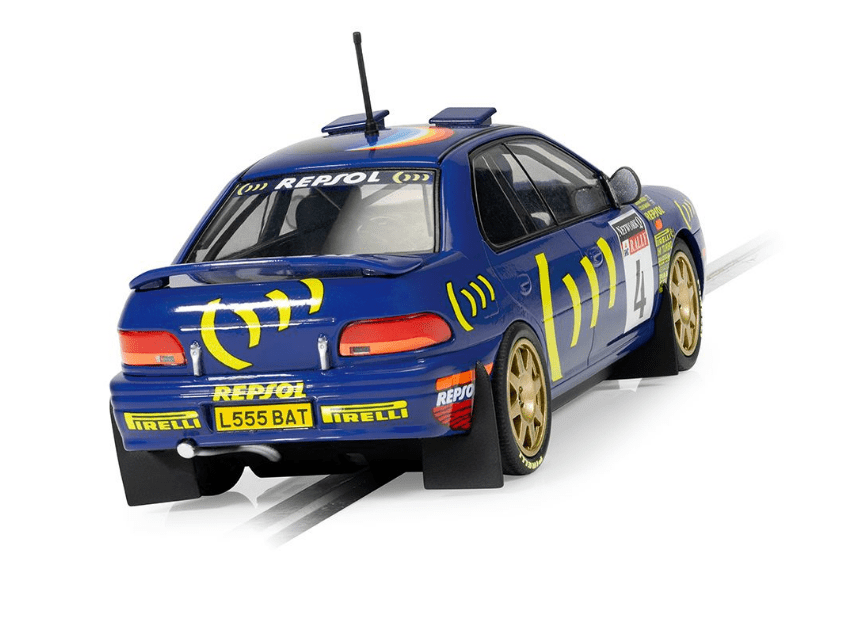 Iconic rally car model: Scalextric Subaru Impreza WRX, Colin McRae 1995 World Champion Edition, detailed race-inspired design.