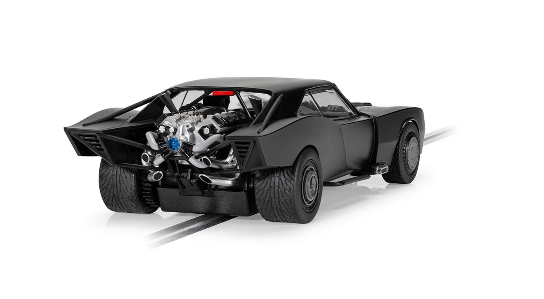 Sleek black Batmobile from the 2022 movie "The Batman", with intricate details and powerful engine visible, ready to take on crime in Gotham City.