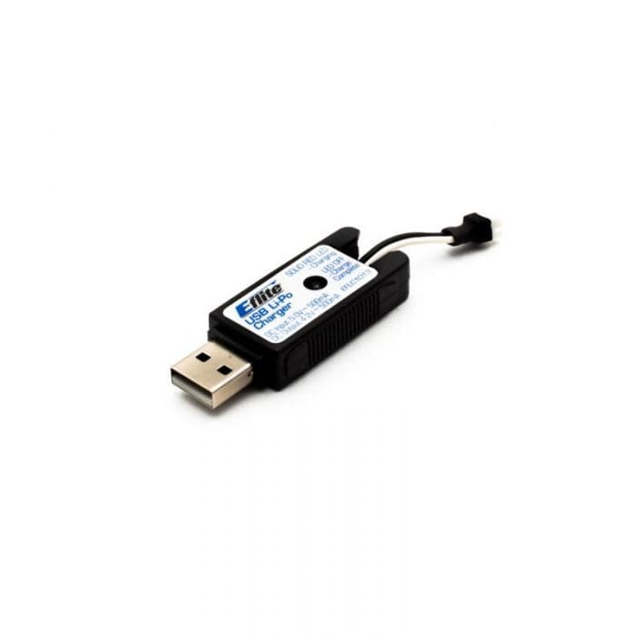Compact USB charger with UMX connector for powering small electronic devices.