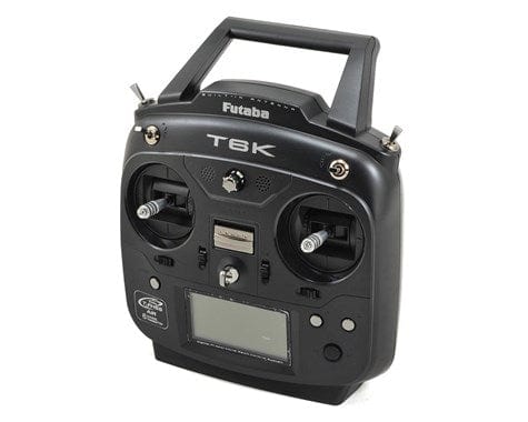 Compact Futaba 6k FHSS transmitter with R3006SB receiver, featuring ergonomic controls and digital display for precise radio control.