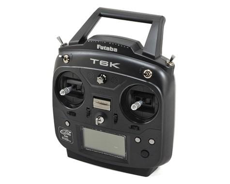 Compact black Futaba 6k FHSS Transmitter with R3006SB Rx, featuring a sleek design and various control knobs for precise radio control.