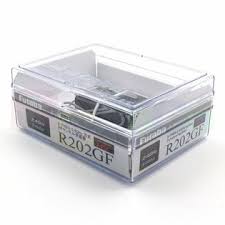 Compact 2.4G S-FHSS receiver in clear plastic case.