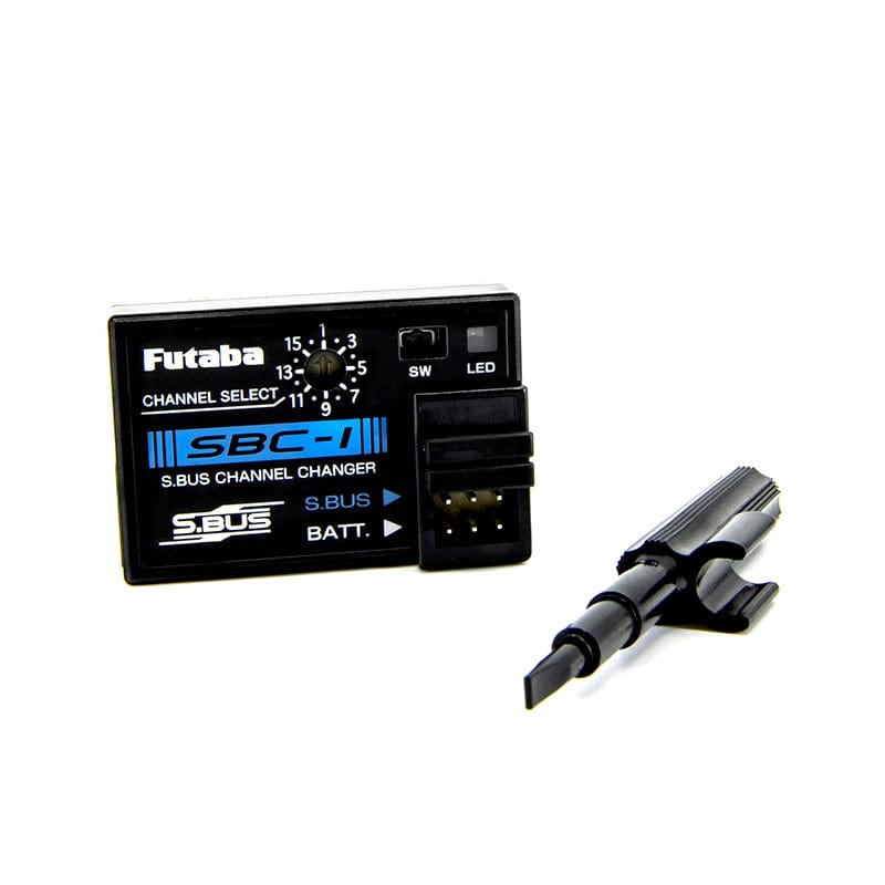 Compact Futaba SBC-1 S.Bus Channel Programmer device for radio control gear, with channel select buttons and LED indicator.
