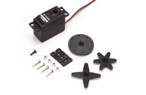 Black Futaba SU300 digital servo with 4.5kg torque at 6V, mounted on a plain white backdrop and surrounded by additional servo components.