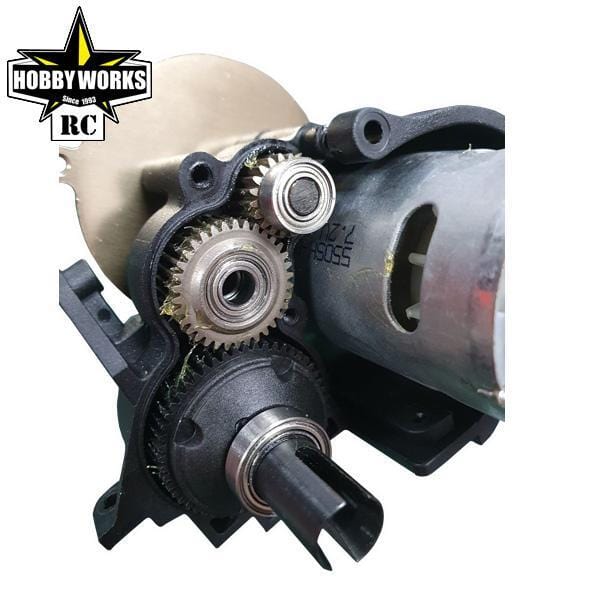 Hobby Works 1/10 2WD Menace V2 Buggy RTR Black - Close-up of high-performance gears and components of an RC car model.