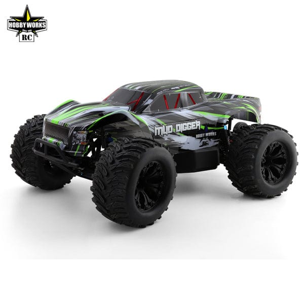 Green and black 1/10 scale Hobby Works Mud Digger V2 2WD electric monster truck ready to race.
