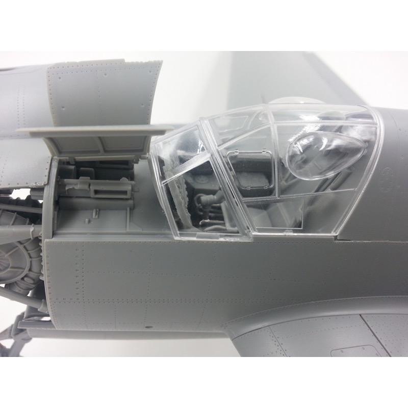 Detailed 1/32 scale plastic model kit of the Do335B-2 heavy fighter aircraft by Hong Kong Models. The image shows the detailed exterior components and transparent canopy of the model, highlighting its intricate design and engineering.