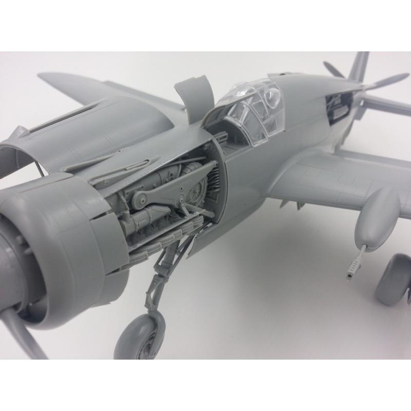 Highly detailed 1/32 scale plastic model kit of the Do335B-2 heavy fighter from Hong Kong Models. The model showcases the intricate engine, fuselage, and wing design of this iconic German World War II aircraft.