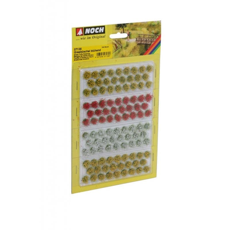 Colorful flowering grass tufts for model train layouts. Noch 07135 Grass Tufts Flowering showcased on a white product packaging background.