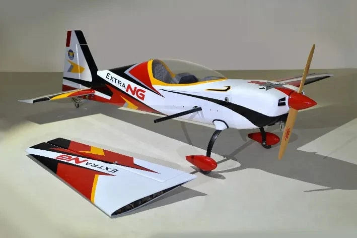 Sleek and streamlined RC plane. Red, white, and black phoenix model extra next gen 50cc carbon ARF aircraft on display.