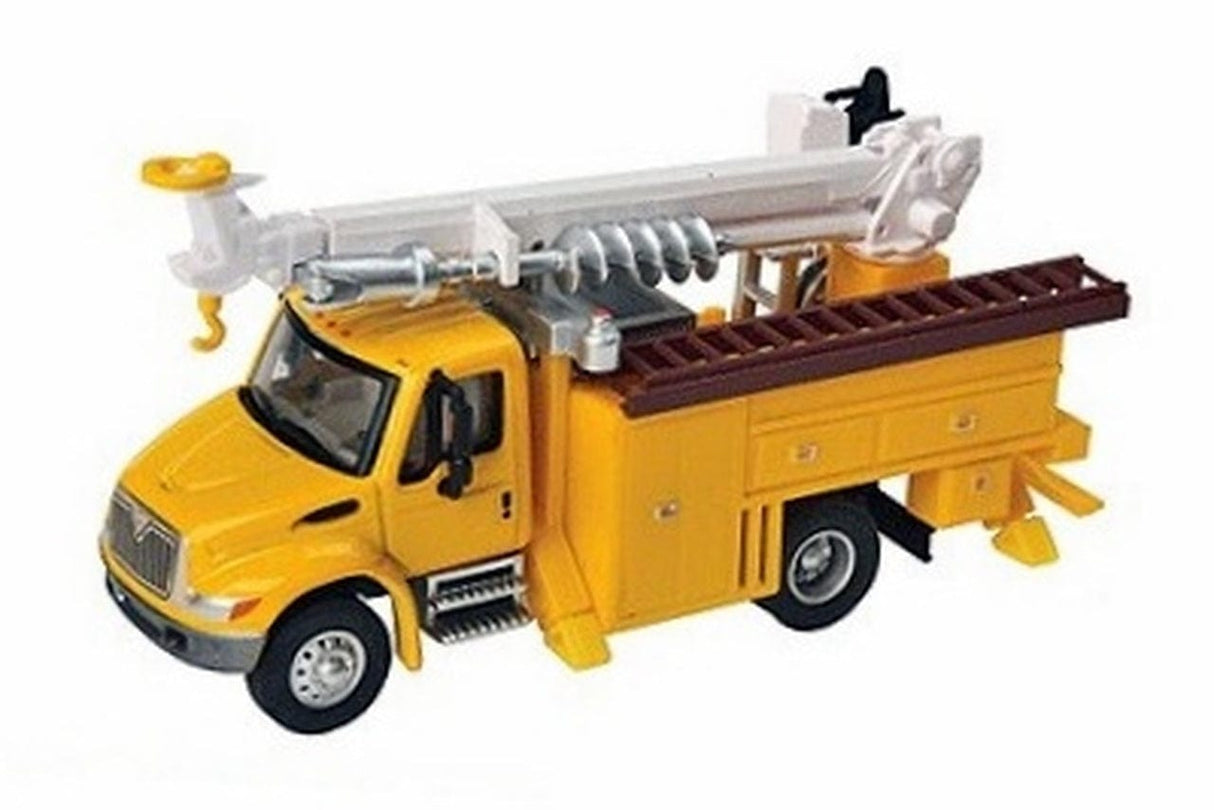 Walthers SceneMaster HO International(R) 4300 Utility Truck w/Drill - Assembled - Yellow Walthers SceneMaster TRAINS - HO/OO SCALE