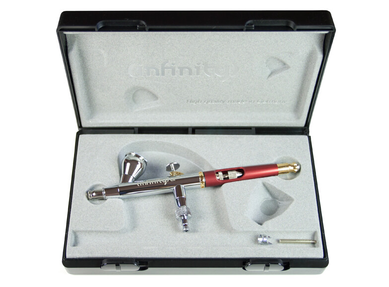 Precision airbrush tool by Harder and Steenbeck, featuring 0.2mm nozzle, housed in a protective case with foam lining.