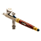 Multifunctional airbrush by Harder & Steenbeck, with 0.2mm and 0.4mm nozzles for precise control in detailed painting.