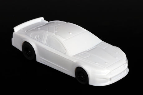 Sleek white AFX Mega-G+ Ford STO slot car with customizable body, ready for the race track.