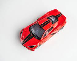 Striking red Corvette C8 Torch model, sleek sports car design