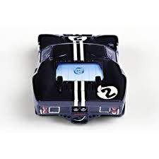 Detailed 1:32 scale AFX Ford GT Mark IIB slot car with classic racing livery and striking blue and white design.