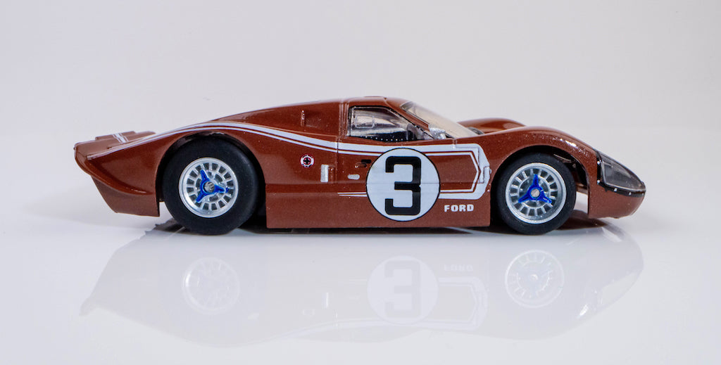 Iconic 1967 Ford GT40 MKIV #3 race car in copper finish, detailed slot car model from AFX.
