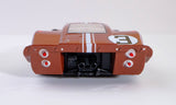 Detailed copper-colored AFX Ford GT40 MKIV #3 slot car, featuring racing stripes and bold number 3 design, ready for track action.