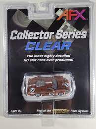 Detailed 1:64 scale collectible slot car model of the iconic Ford GT40 MKIV race car, finished in a stunning copper color scheme as seen at the 1967 Le Mans 24-hour endurance race.