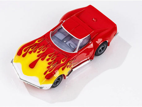Vibrant red and yellow Corvette slot car with flame decals.