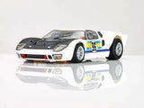 Sleek AFX 22057 HO Mega G+ Ford GT40 Mark II #96 racing slot car on a reflective surface.