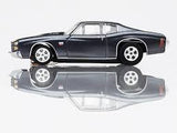 Detailed black Chevelle SS454 slot car with sleek design and racing stripes, ready for high-performance slot car racing.