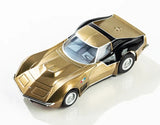 Metallic gold sports car model with sleek design and detailed features, showcased on a plain background.