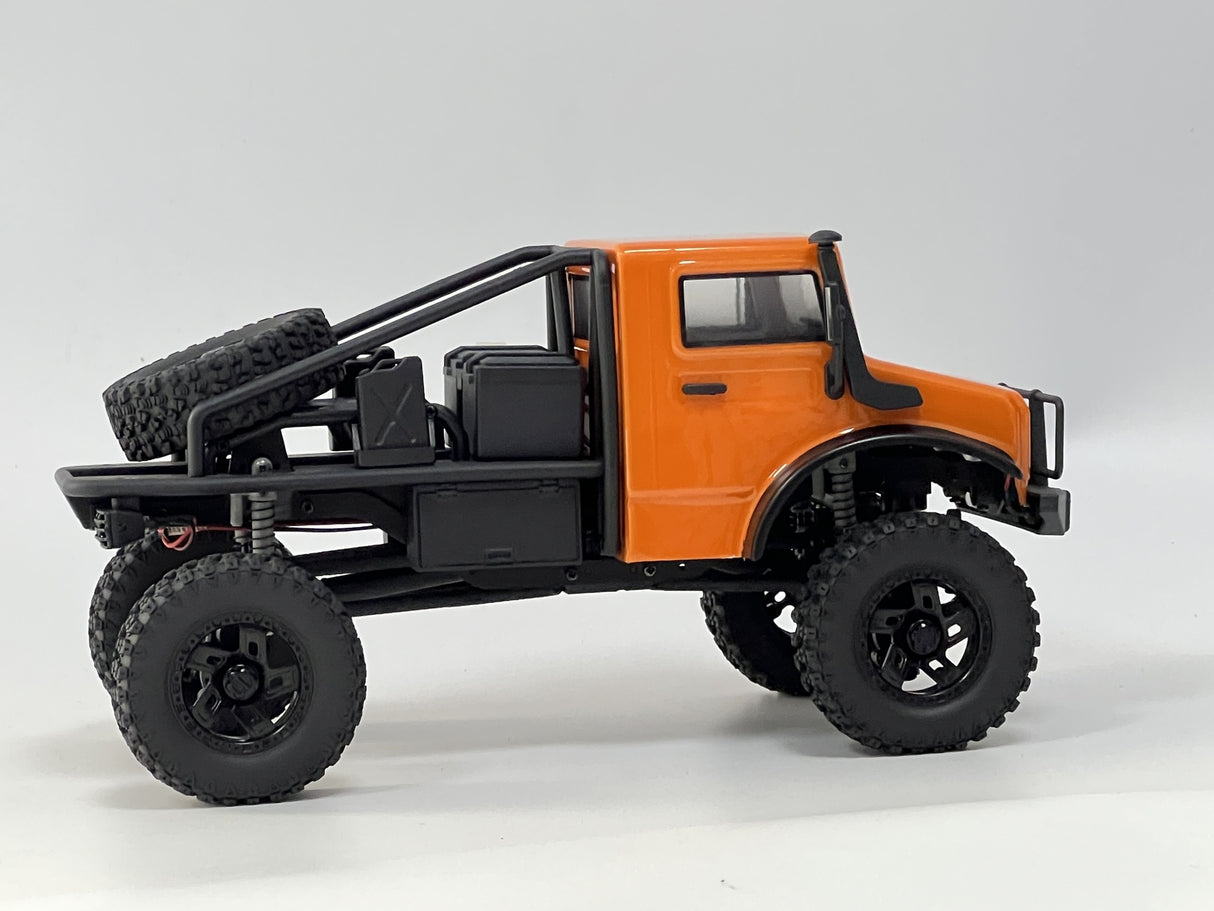 Rugged off-road RC car, Hobby Plus 1/18 CR18P EVO Trail Hunter in eye-catching orange, ready for outdoor adventures.