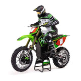 Sleek green and black Losi Promoto-MX 1/4 Motorcycle with Pro Circuit scheme, featuring realistic dirt bike design and rider in full racing gear.