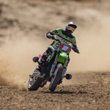 Losi Promoto-MX 1/4 Motorcycle RC racer speeding on dirt track with Pro Circuit Scheme.