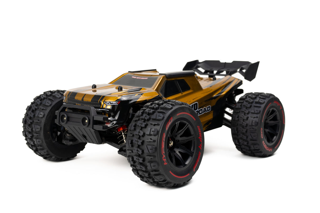 Rugged MJX 1/14 Hyper Go 4WD Off-road Brushless RC Truggy in vibrant orange color with large tires for high-speed, all-terrain performance.