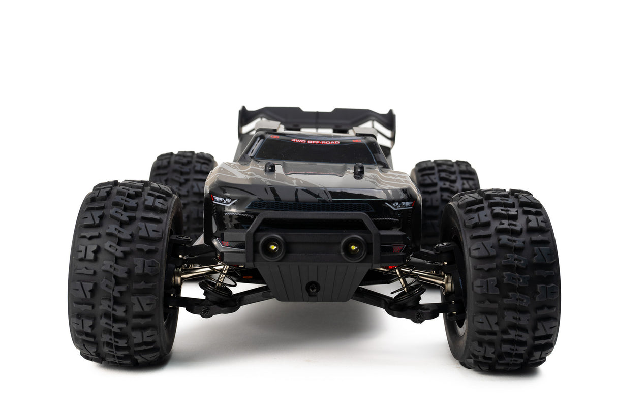 Powerful MJX 1/14 Hyper Go 4WD off-road RC truggy with brushless motor and large knobby tires for high-speed adventure.