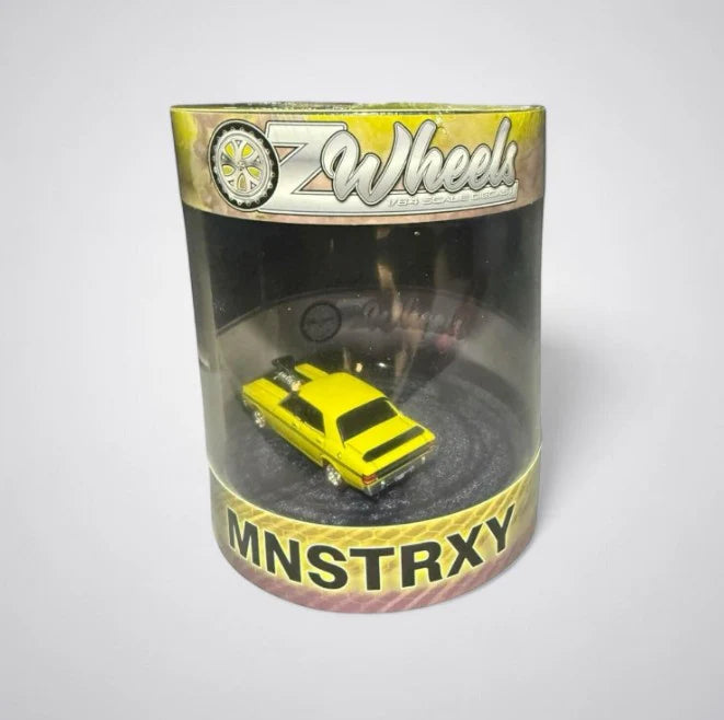 Oz Wheels 1/64 Monster XY Falcon Skid Car in Cylinder Display