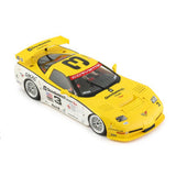 Detailed 1/32 scale Chevrolet Corvette C5-R slot car in vibrant yellow and white racing livery, showcasing its sleek sports car design.