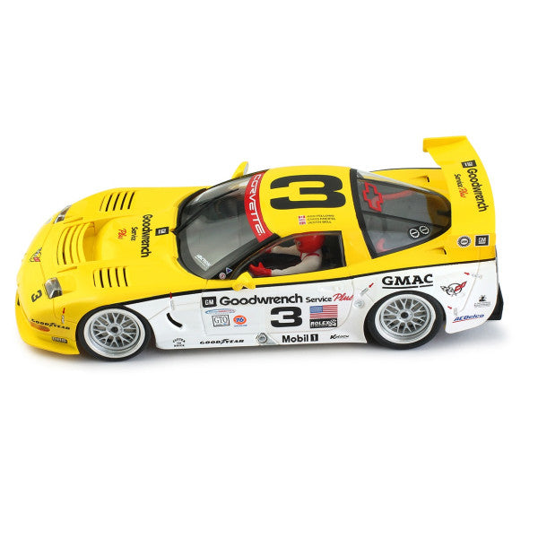 Detailed slot car model of a yellow Chevrolet Corvette C5-R race car with the number 3 prominently displayed on the body. The car features sponsor logos and graphics, indicating a professional racing vehicle. This detailed 1/32 scale model is part of the REVO Slot product line and is designed for enthusiasts and slot car racing hobbyists.