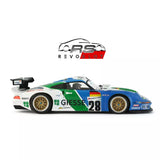 Detailed 1/32 scale Porsche 911 GT1 #28 Konrad Motorsport slot car with prominent REVO Slot branding, green and blue racing livery, and high-performance details.