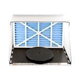 Compact spray booth with blue filter and turntable for professional airbrushing tasks.