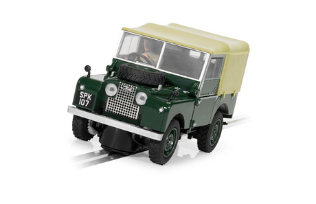 Detailed vintage green Land Rover Series 1 slot car on a white background.