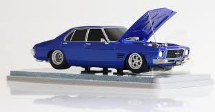 DDA 1/24 Razzle Berry Holden HQ GTS Custom 4 Door Light Up - Prebuilt Plastic Model - Hobbytech Toys