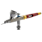 Versatile Harder & Steenbeck Infinity Giraldez 2-in-1 airbrush, featuring interchangeable 0.2mm and 0.4mm nozzles for precise painting.