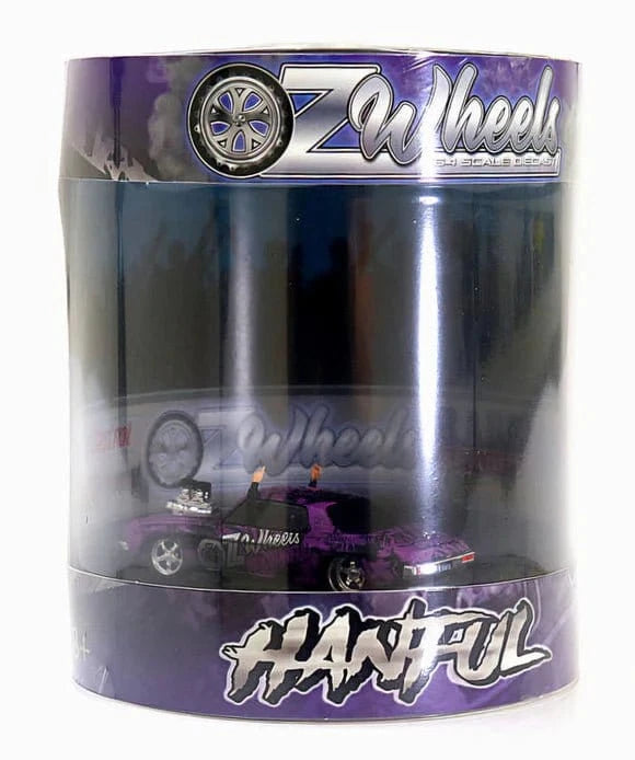 Oz Wheels 1/64 OZ Wheels Wrapped Hanful Monaro Skid Car in Cylinder Display - Hobbytech Toys