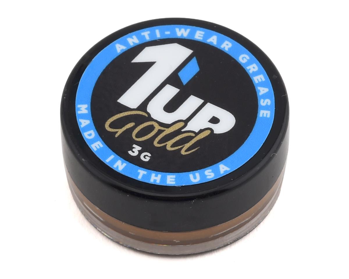 Small black pot of 1UP Racing Gold Anti-Wear Grease for racing or hobby use, made in the USA.