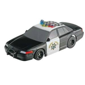 Sleek police car with flashing lights, ready for high-speed pursuit on the highway.